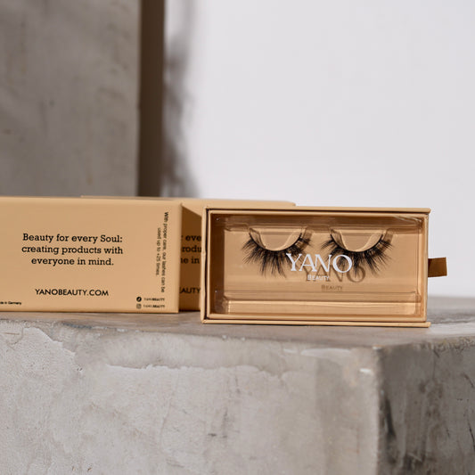 Sleek packaging of Honey faux mink lashes by Yanobeauty, emphasizing the brand's commitment to quality and style