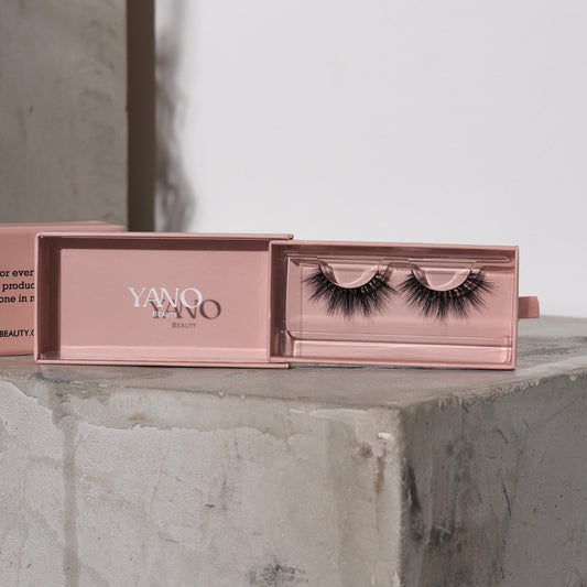 Rose lashes elegantly presented in Yanobeauty's signature packaging, highlighting the product's luxurious and feminine appeal
